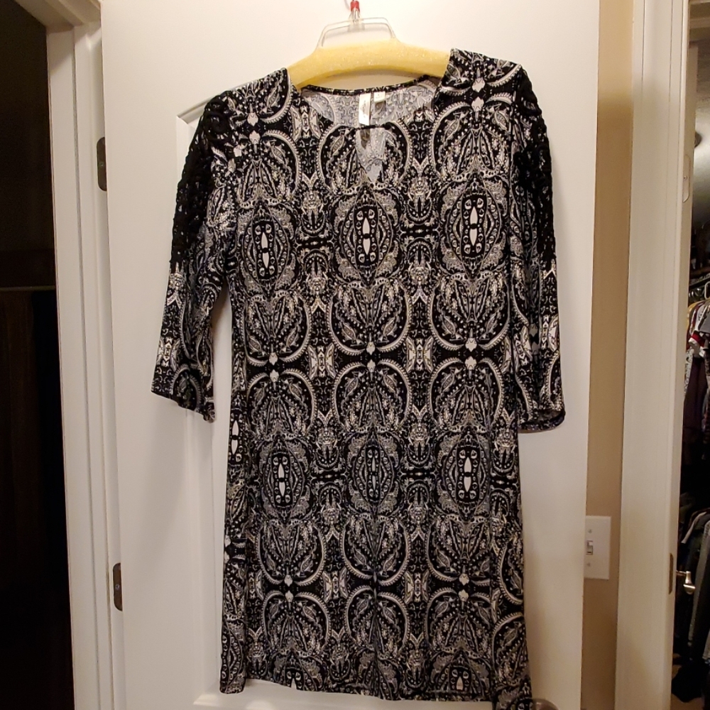 Tacera Knee Length Dress with lace. Large